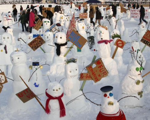 Berlin Snowmen Demonstrate Against Global Warming